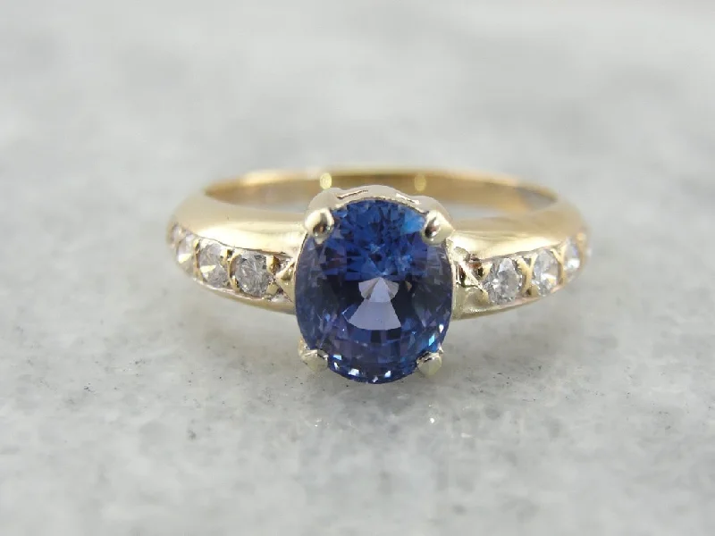 fancy colored diamond engagement rings -Periwinkle Blue Sapphire Engagement Ring with Diamond Accented Shoulders