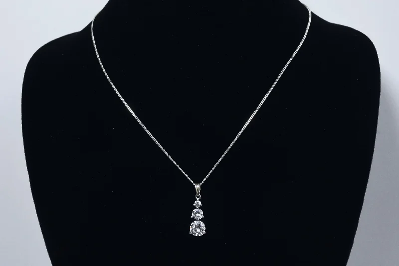 silver pendant necklaces for women -Avon - Sterling Silver Graduated Cubic Zirconia Drop Pendant on Sterling Silver Chain Necklace - 16"