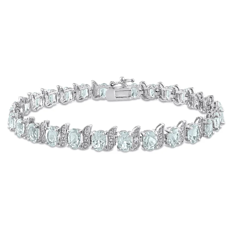 designer bracelets for women -Mimi & Max 11 1/5ct TGW Oval Aquamarine and Diamond Accent S Link Tennis Bracelet in Sterling Silver