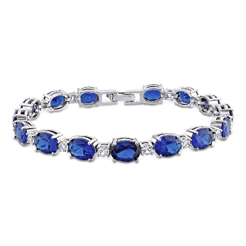 classic solitaire rings -32 CT TGW Oval Created Blue and White Sapphire Bracelet in Sterling Silver